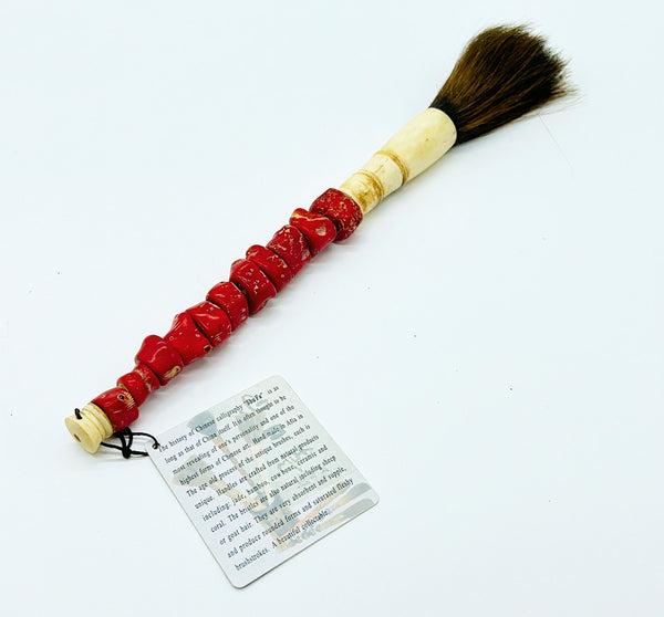 Vintage Chinese calligraphy brush with a red stacked coral stone handle. (1 of 1)