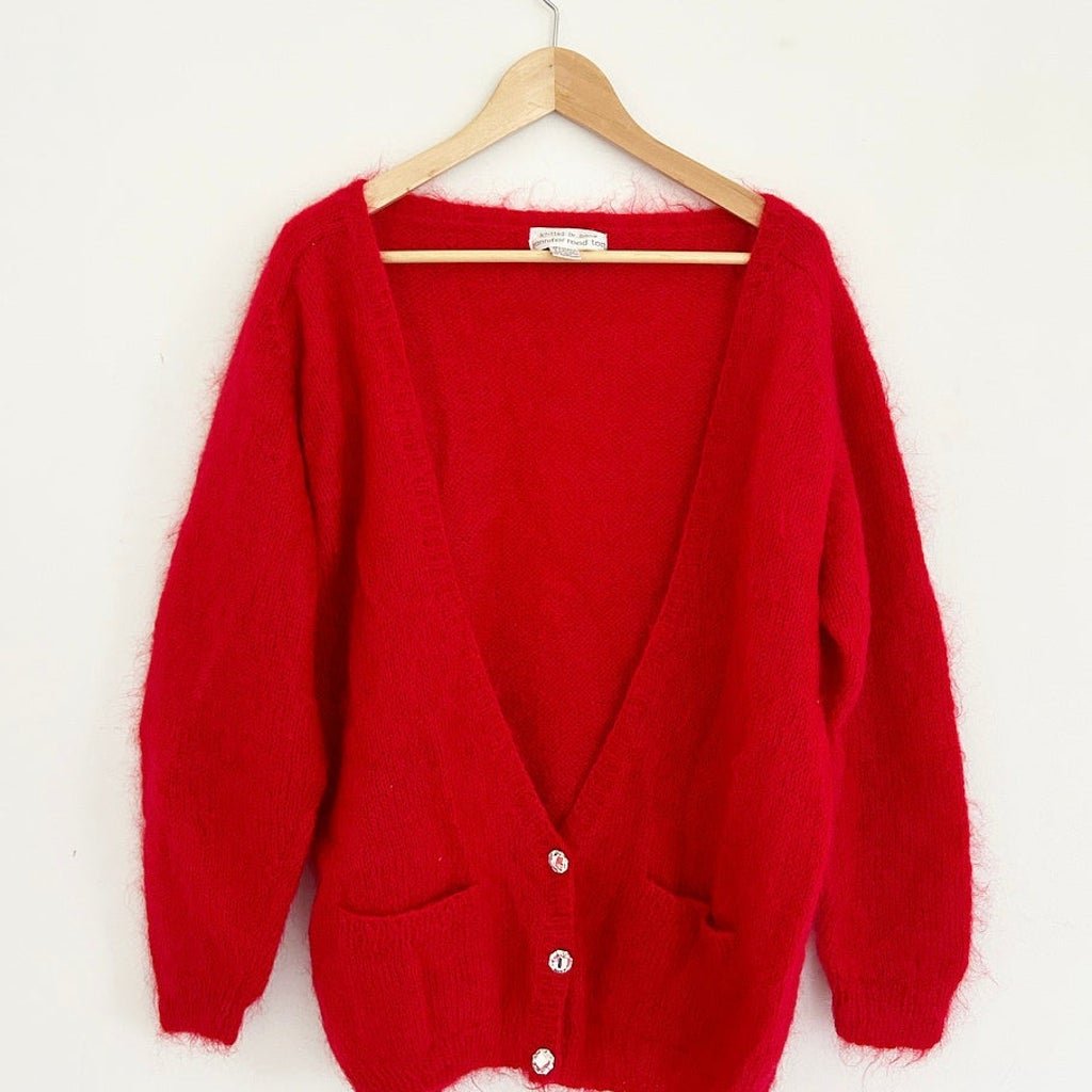 Vintage red Cardigan Sweater. 2 pockets on front with 3 crystal / faux stone buttons. Like new cond: Vintage red Cardigan Sweater. 2 pockets on front with 3 crystal / faux stone buttons. Like new condition. Made by JENNIFER REED TOO/ -Womenâ€™s size 2x -Knitted by hand - 60 % mohair - 32 % acryl