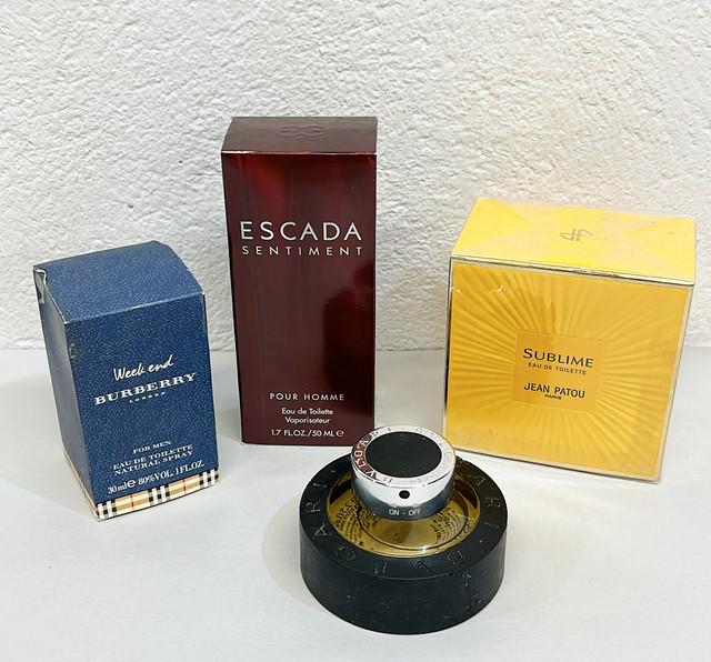 Vintage perfume / cologne lot set. 4 bottles.: Vintage perfume / cologne lot set. 4 bottles. ESCADE, BURBERRY, BVLGARI and JEAN PATOU PARIS brands. See photos for more description. All bottles full. Vintage from the late 80s -90s.