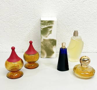 Vintage perfume lot - set of dud bottles.: Vintage perfume lot - set of dud bottles. Brands include: ROMEO GIGLI, DONNA KAREN, COPARD, MARINA PICASSO, and VICKY TIEL. One of the Romeo GIGLI bottles is almost empty - the other matching bottle i