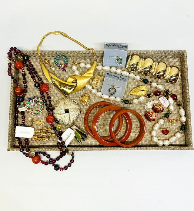 Large lot of vintage fashion designer jewelry includes, necklaces, bracelets, brooches, charms, belt: Large lot of vintage fashion designer jewelry includes, necklaces, bracelets, brooches, charms, belt buckles. Tray not included. Some pieces still have their Neiman Marcus price tags attached.
