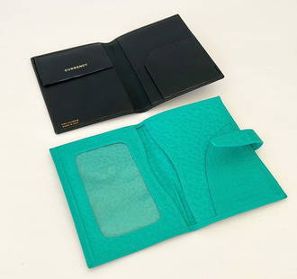 Lot set of 2 leather passport / wallets.: Lot set of 2 leather passport / wallets. Green one is stamped Mulholland Brothers - leather approx 6x4. And the black one is not stamped by the maker but is stamped on interior fine calfskin made in