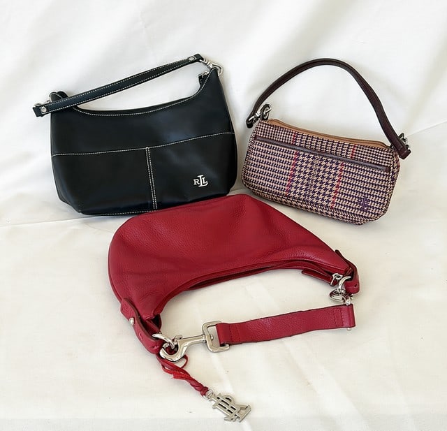 Lot set of 3 womens purses / hand bags all by Ralph Lauren.: Lot set of 3 womens purses / hand bags all by Ralph Lauren. Red leather approx 8 tall x 11 wide. Black leather approx 8 x 11. Plaid houndstooth purse approx 4x9.