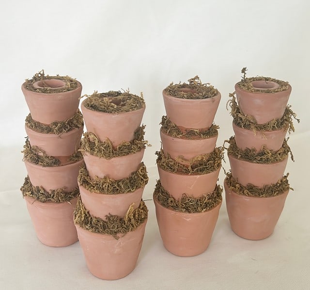 Set of 4 matching terracotta pot style candle holders with real moss accents. (1 of 2)