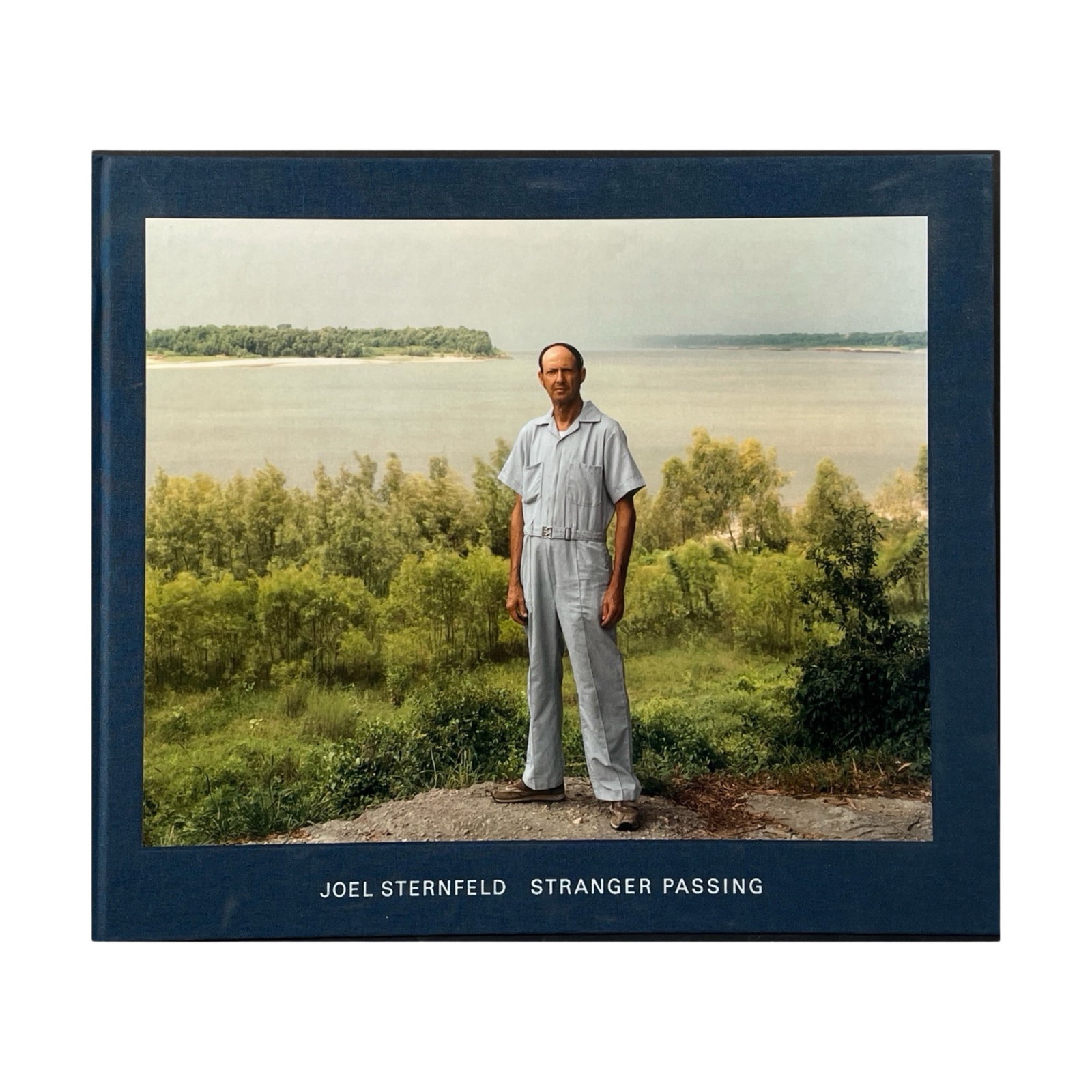 JOEL STERNFELD: STRANGER PASSING. STEIDL, 2012.: [PHOTOGRAPHY BOOK MONOGRAPH] JOEL STERNFELD: STRANGER PASSING. STEIDL, 2012. Second revised ed. Large oblong 4to. Hardcover. 159pp. 120 colour photographs of Asia's big cities. Clean, unmarked with th