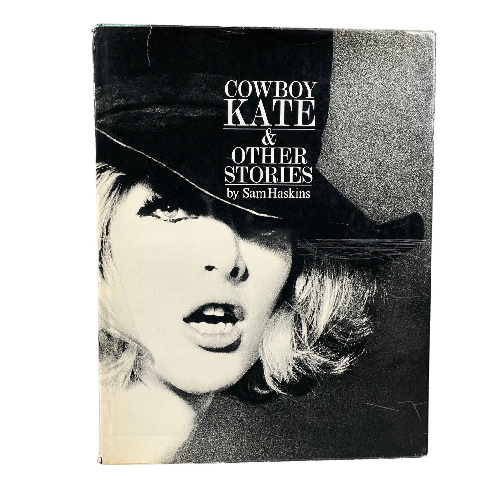 SAM HASKINS; COWBOY KATE & OTHER STORIES. 1st Ed.: [PHOTOGRAPHY BOOK MONOGRAPH] SAM HASKINS; COWBOY KATE & OTHER STORIES. Crown, NY; 1965. 1st. Ed. Large 8vo. Hardcover with Dj. Ink name and small xmas gift card partly affixed to ffep, corners slightl
