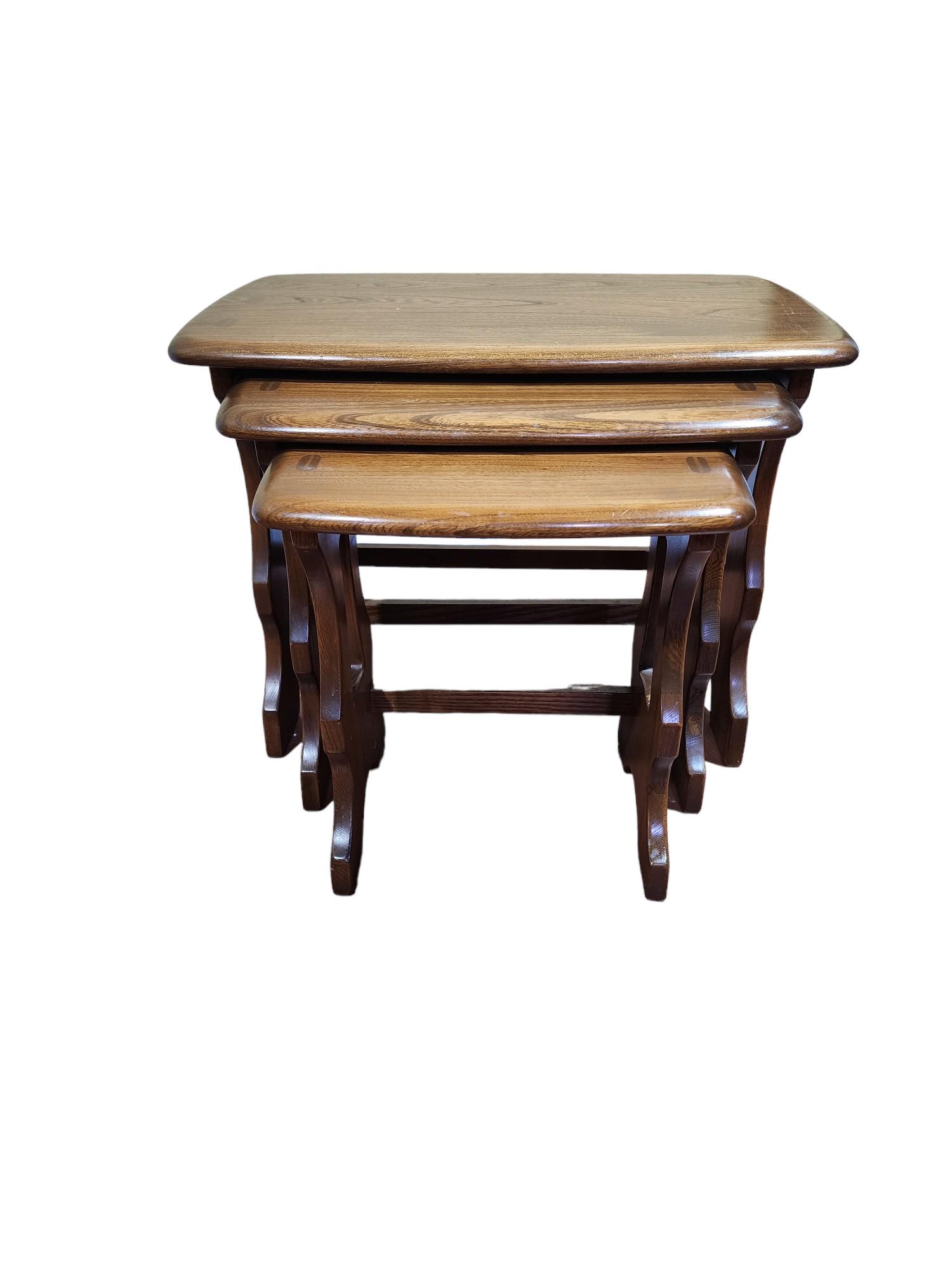 Ercol Set of 3 Nesting Table: Ercol of England Set of 3 "Golden Dawn" Elm nesting tables. Excellent condition.