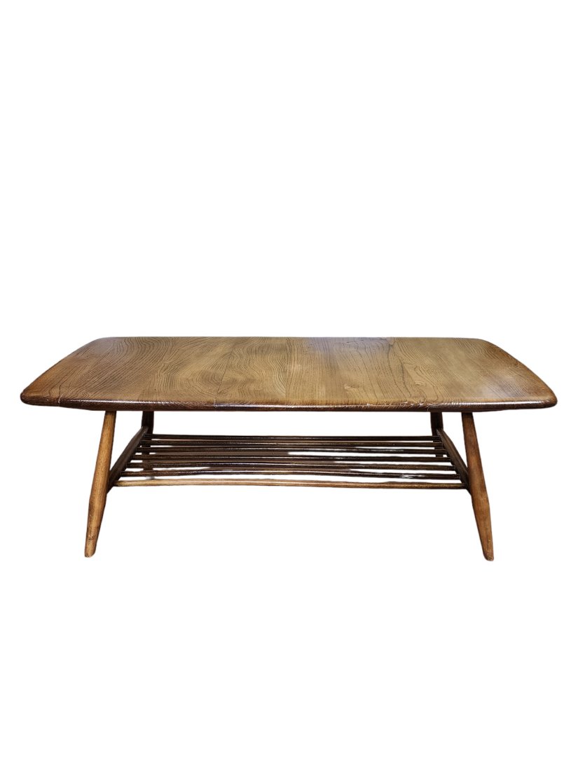 1960s Ercol Mid Century Elm and Beech 459 Coffee Table: Excellent condition Mid-century Ercol coffee table model #459, contstructed of solid elm and beech with under shelf, darker Golden Dawn finish. Designed by Lucian Ercolani, great example of this iconi