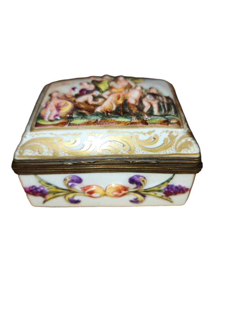 18th Century Capodimonte Snuff Box: Circa 1775 - 1800 Capodimonte snuff box, beautifully painted and gilt. Early Capodimonte backstamp present. Painting, scenery, gilt, hardware are all in excellent condition. A rare and remarkable find