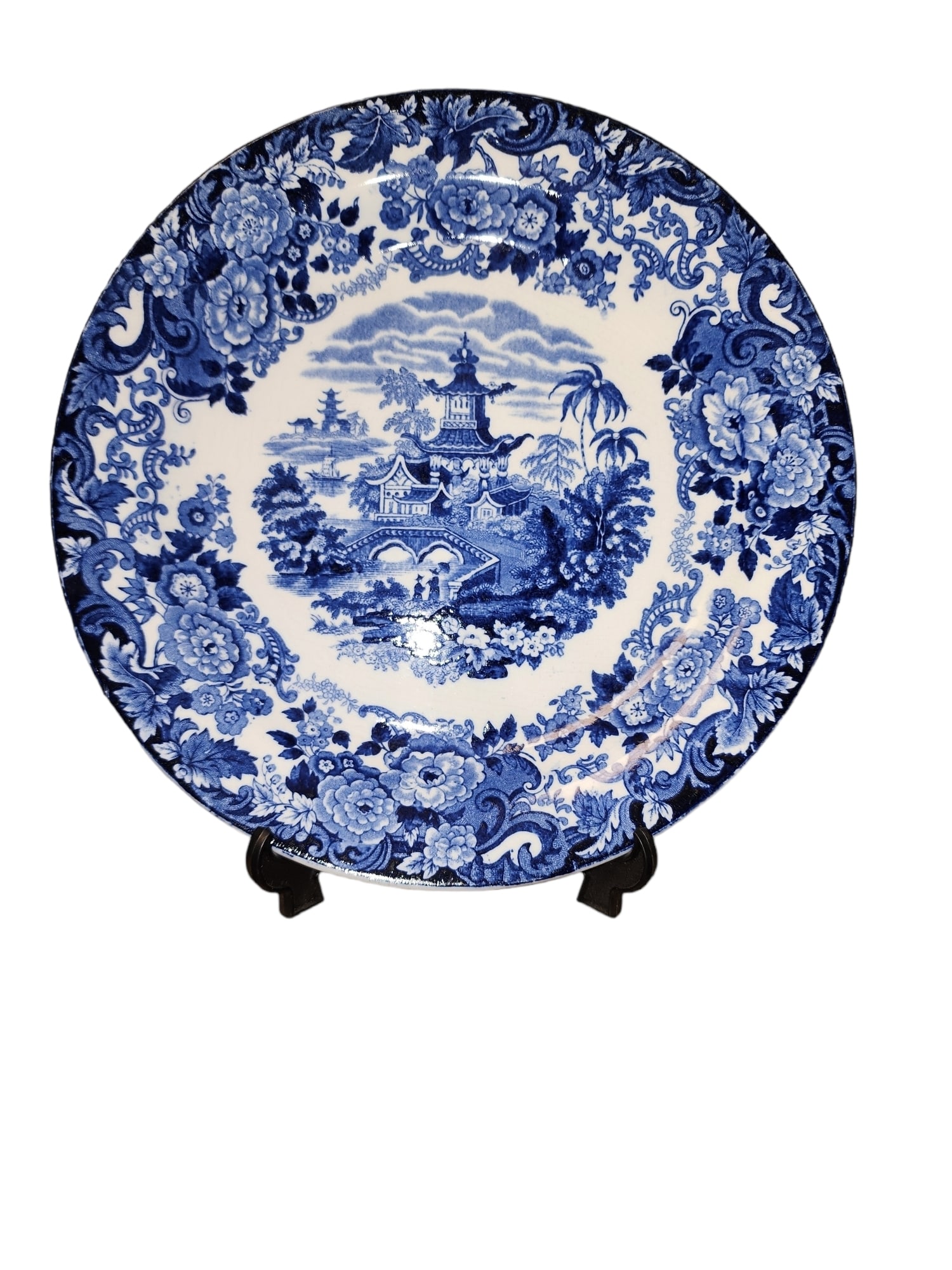 Circa 1876 Wedgwood Dinner Plate: Stunning cobalt blue and white Wedgwood dinner plate with central pagoda motif. Backstamp present. Excellent condition - small surface hairline cracks to rear of plate.Measures 9 x 9 x 1 inches