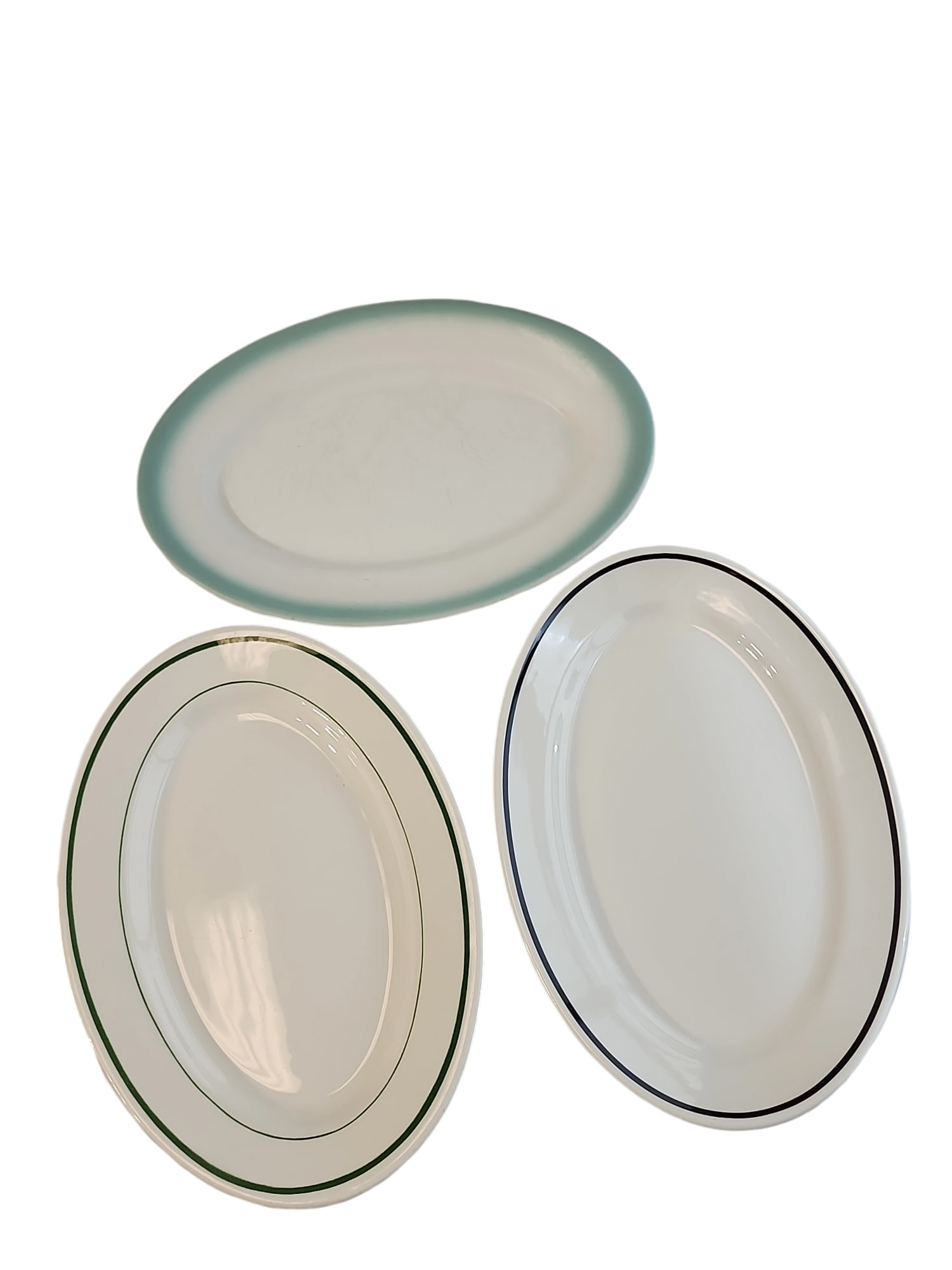 Mid Century Restaurant Ware Platter Trio: Trio of collectable mid-century restaurant ware meat platters.One Shenango Pottery, aquamarine trim, A20 backstamp for 1962 - 12.5 x 8.5 x 1.5 inchesOne Buffalo Pottery, green trim, circa 1950s backst