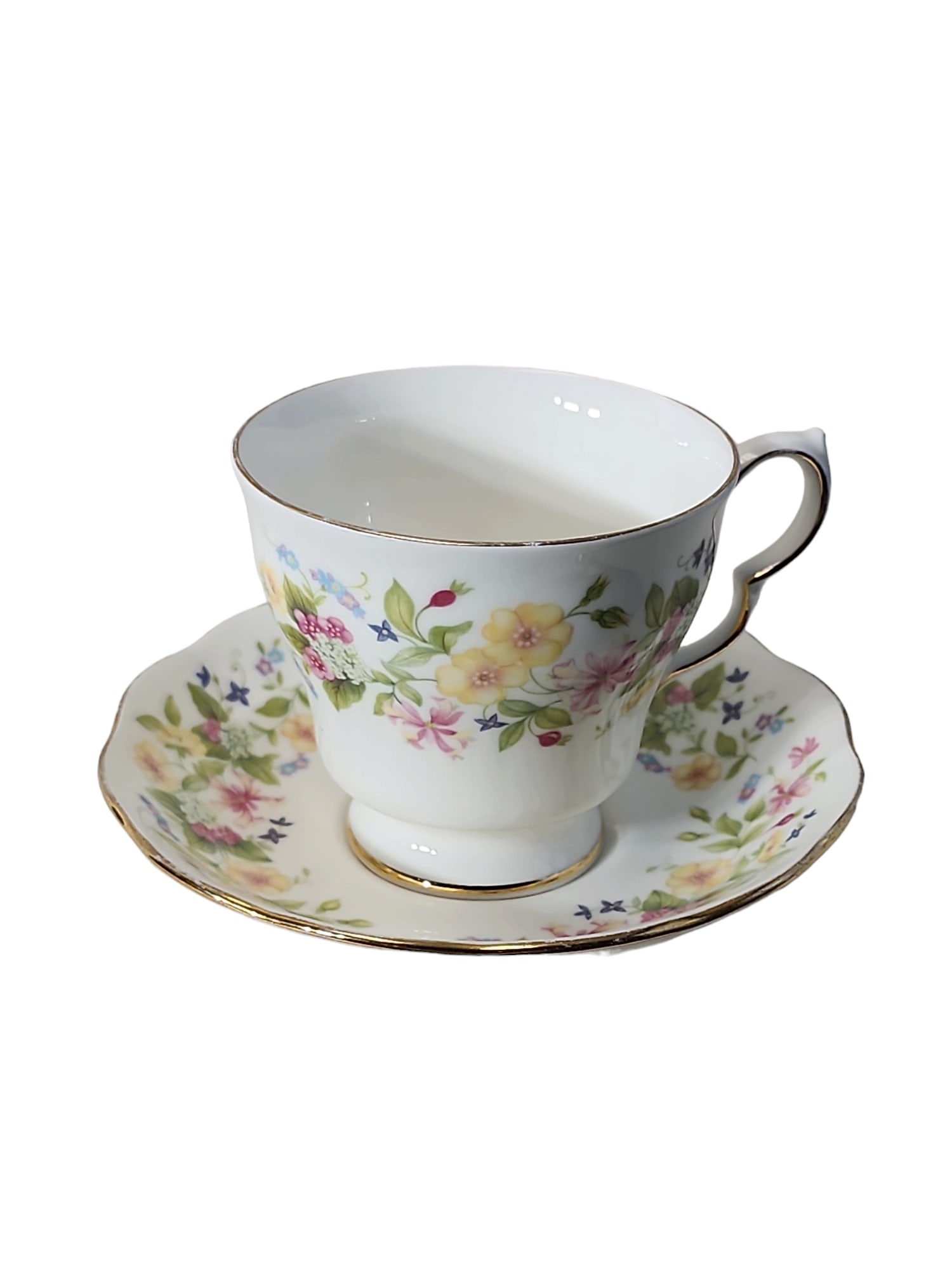 1950s Colclough Hedgerow Teacup and Saucer Set: Very pretty 1950s Colclough teacup and saucer set, Hedgerow pattern, vibrant floral motif, in excellent condition.Backstamps present.Cup dimensions are 4.25 x 3.5 x 3 inchesSaucer dimensions are 5.5 x