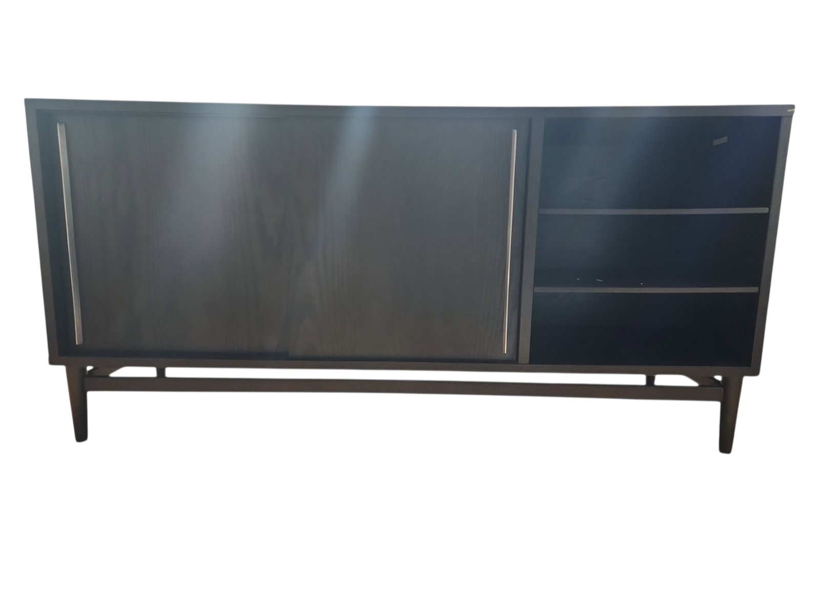 1990s Vintage West Elm Sideboard: Lovely vintage West Elm black walnut sideboard in excellent condition. MCM vibe, double sliding doors over adjustable shelving, tapered leg frame.Measures 66 x 20 x 32 inches.