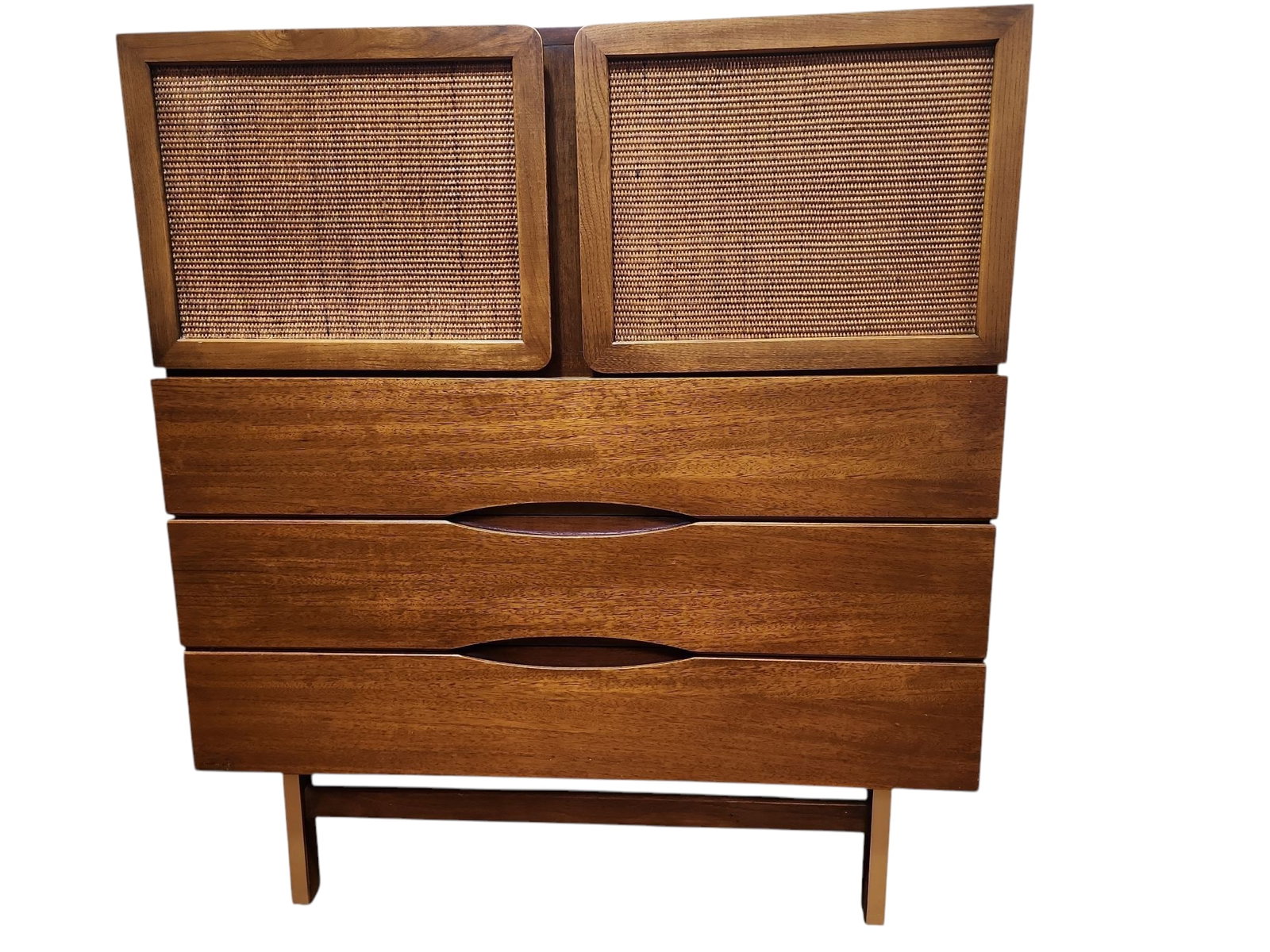 1950s Mid Century Modern American of Martinsville Merton Gershun High Boy Dresser: Stunning MCM American of Martinsville walnut high boy dresser in excellent condition. Cane front doors open to four drawers, atop three full size drawers, on metallic embellished legs.Walnut construct