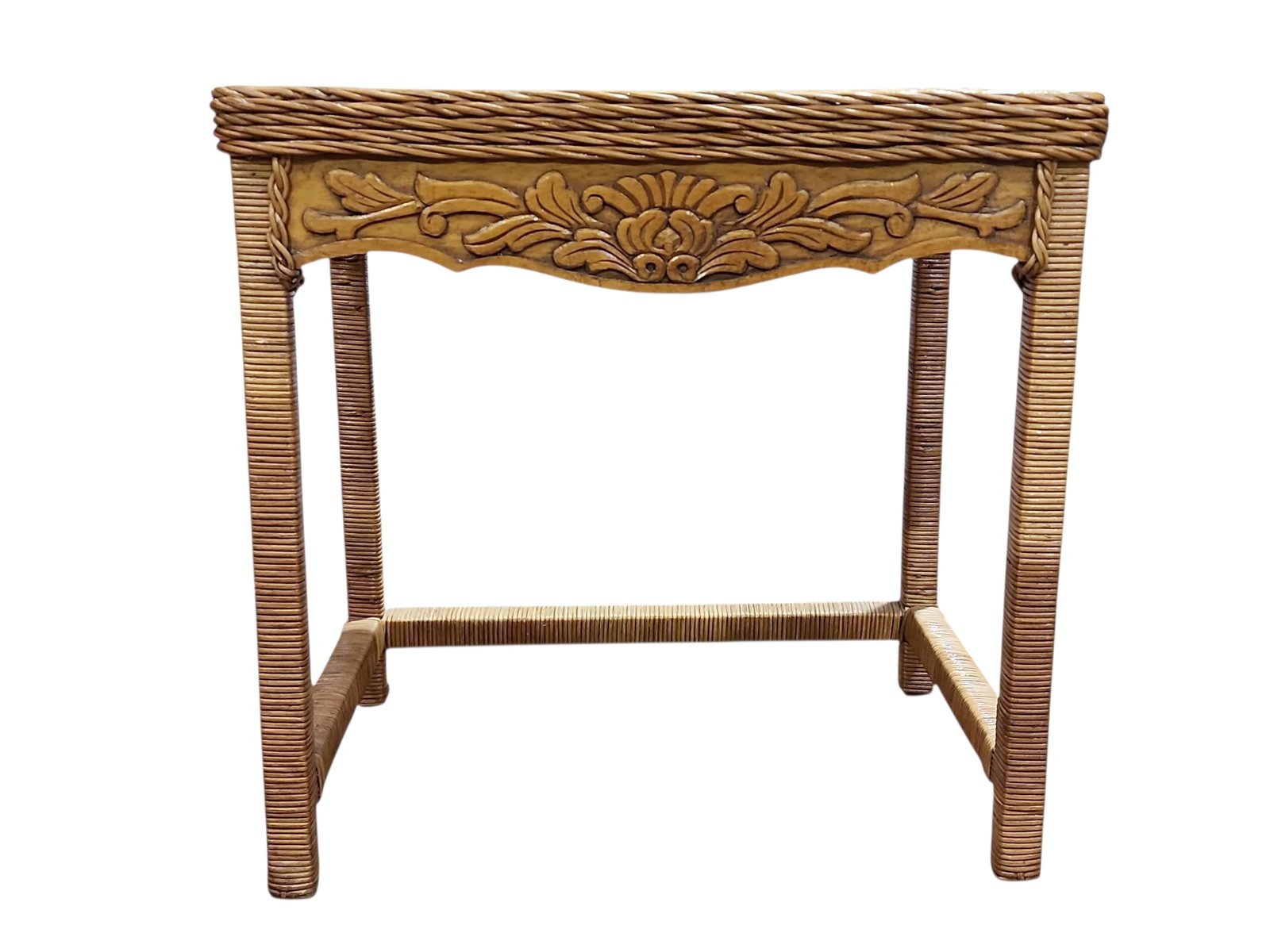 1950s Vintage French Wood and Wicker Side Table: Lovely vintage French wood and wicker side table in excellent condition. Continental wicker design of wooden table with wicker and rattan wrap and tie, ornately carved apron, very stable for the size.