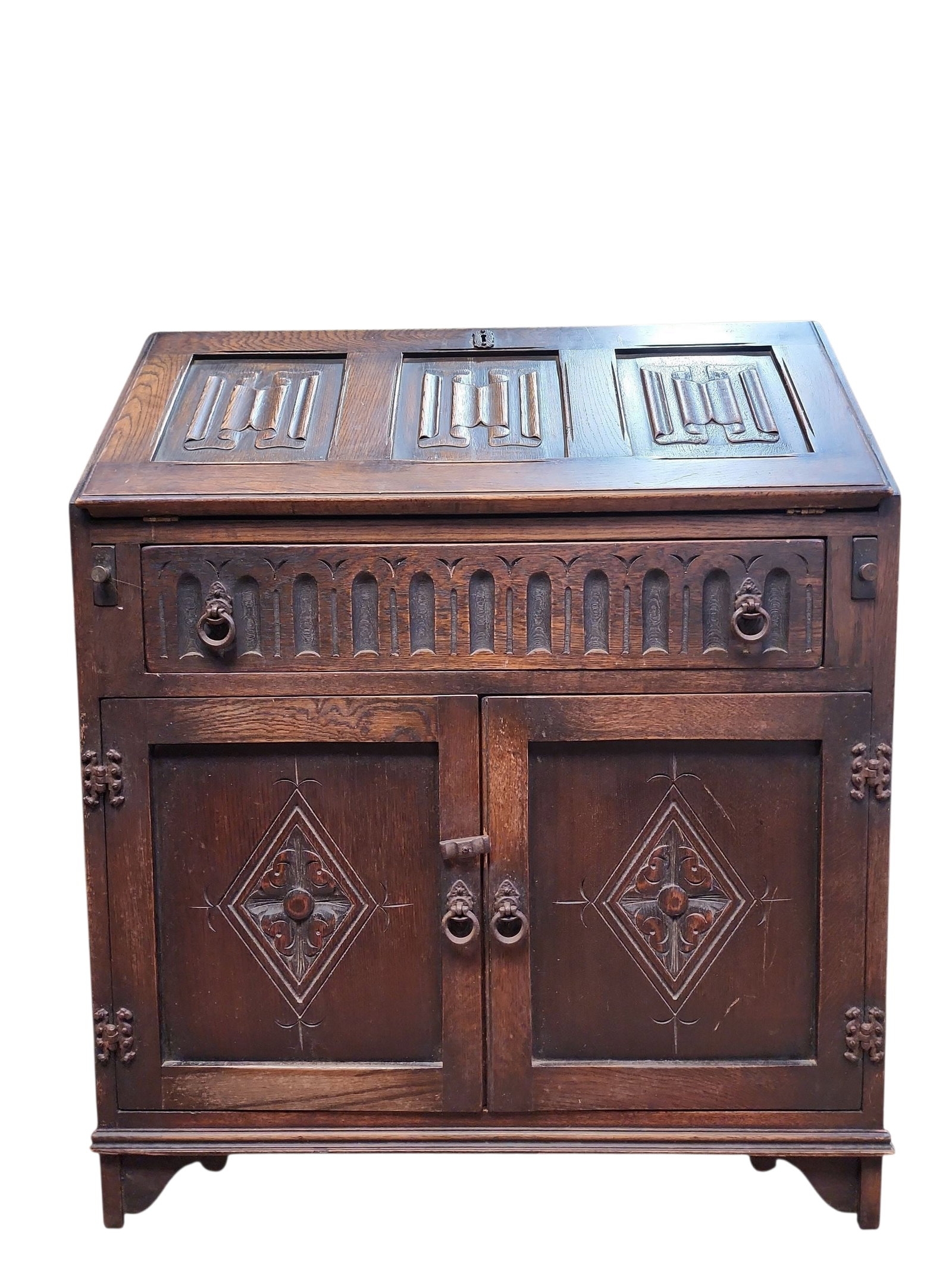 1940s English Jaycee Furniture Linen Fold Bureau: Rare English Jaycee Furniture linen fold bureau in excellent condition. Solid oak construction, hand carved Elizabethan details, excellent example of the fine furniture made by the Jack Cohen founded