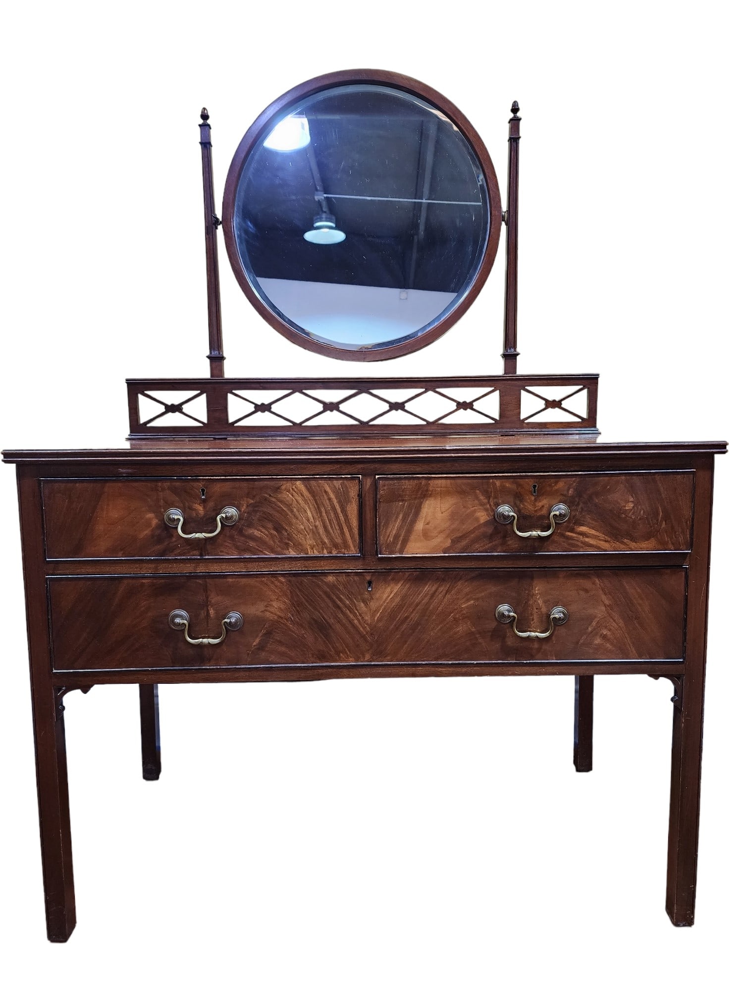 Early 1900s Edwardian Mahogany Dressing Table With Mirror: Superb Edward VII mahogany dressing table with tilt mirror in excellent condition. Three drawers, lattice back, original glass mirror, would make a fantastic vanity. Base height is 31" inches without