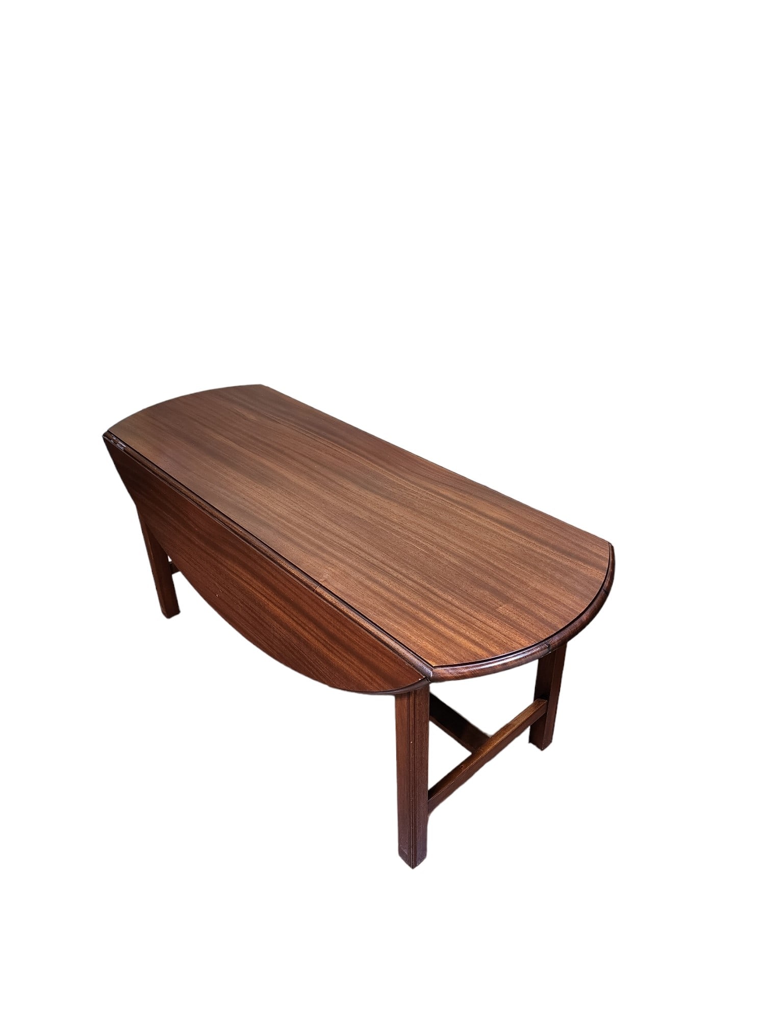 1960s Swedish Mid-Century Rosewood Drop Leaf Coffee Table: Stunning Swedish mid-century rosewood drop leaf coffee table in excellent condition. Sweden makers mark on hardware underneath. Solid heavy table with lovely finish and hue.Closed dimensions: 51 x 19
