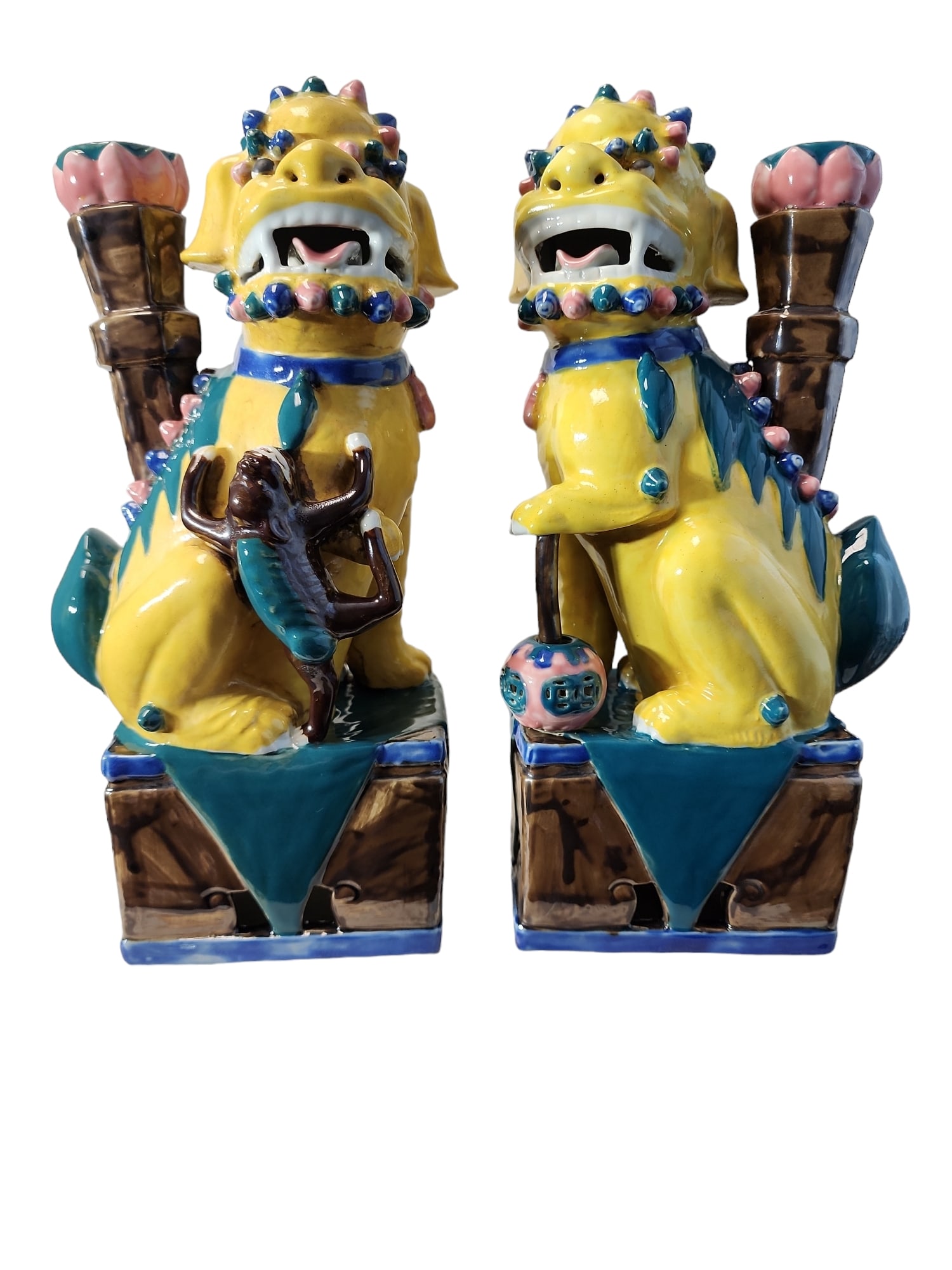 Early 20th Century Chinese Foo Dogs - a Pair: Superb pair of early 20th century Chinese Foo Dogs, both in excellent condition.Female and Male representation, movable ball under male paw, open top incense holder to rear of both, backstamp present.