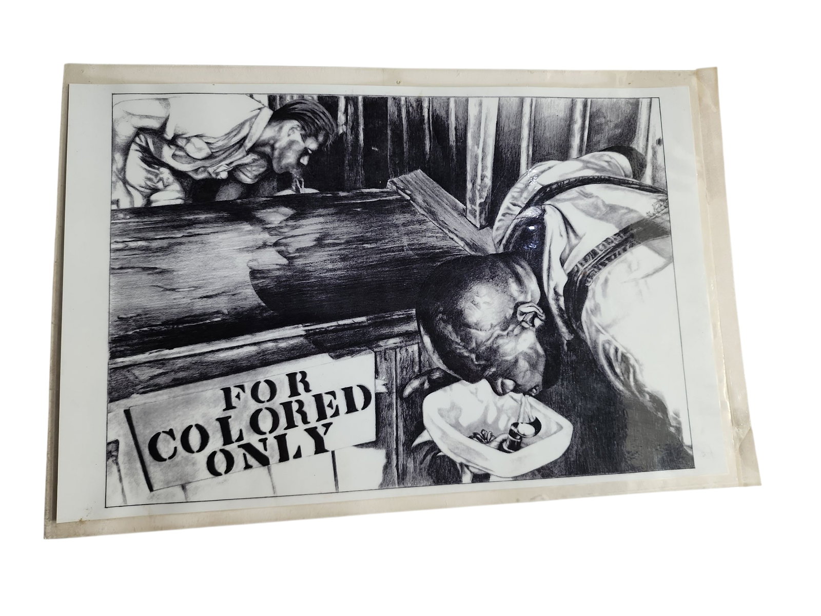 Vintage Drawing of Uncredited 1950s Press Photo: Laminated vintage drawing of an uncredited press photo from the 1940s or 1950s, exemplifying the racial segregation of the Jim Crow era. Excellent condition, measures 18 x 12 inchesSOLD FOR HISTORICAL