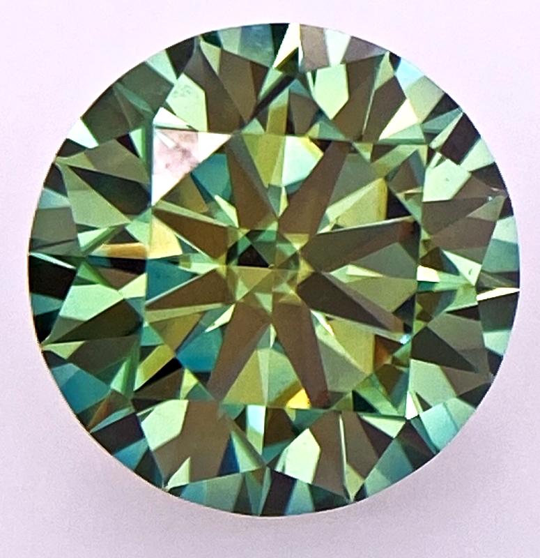 2.54 Carat Green Moissanite: 2.54 Carat Green Moissanite Shape - Round Brilliant Color - Green Transparency - TransparentDimensions - 9 mm Good quality with luster. Perfectly suited as an investment, collector's item or for use i
