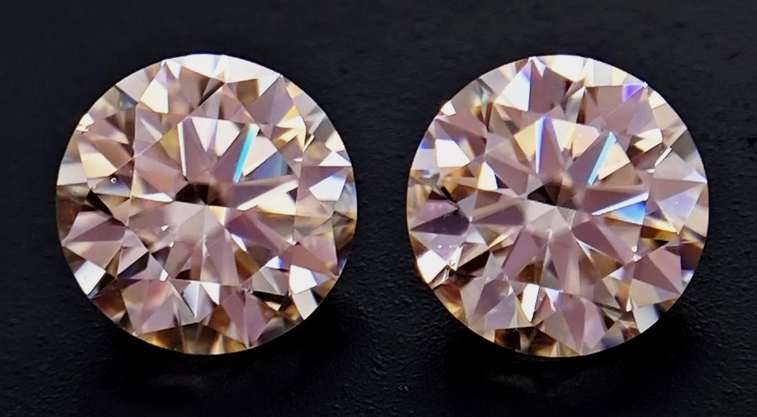 2.96 Carat Champagne Moissanite Shape - Round Brilliant Cut: 2.96 Carat Champagne Moissanite Shape - Round Brilliant Color - ChampagneTransparency - TransparentDimensions - 7.5 mm Good quality with luster. Perfectly suited as an investment, collector's item or 