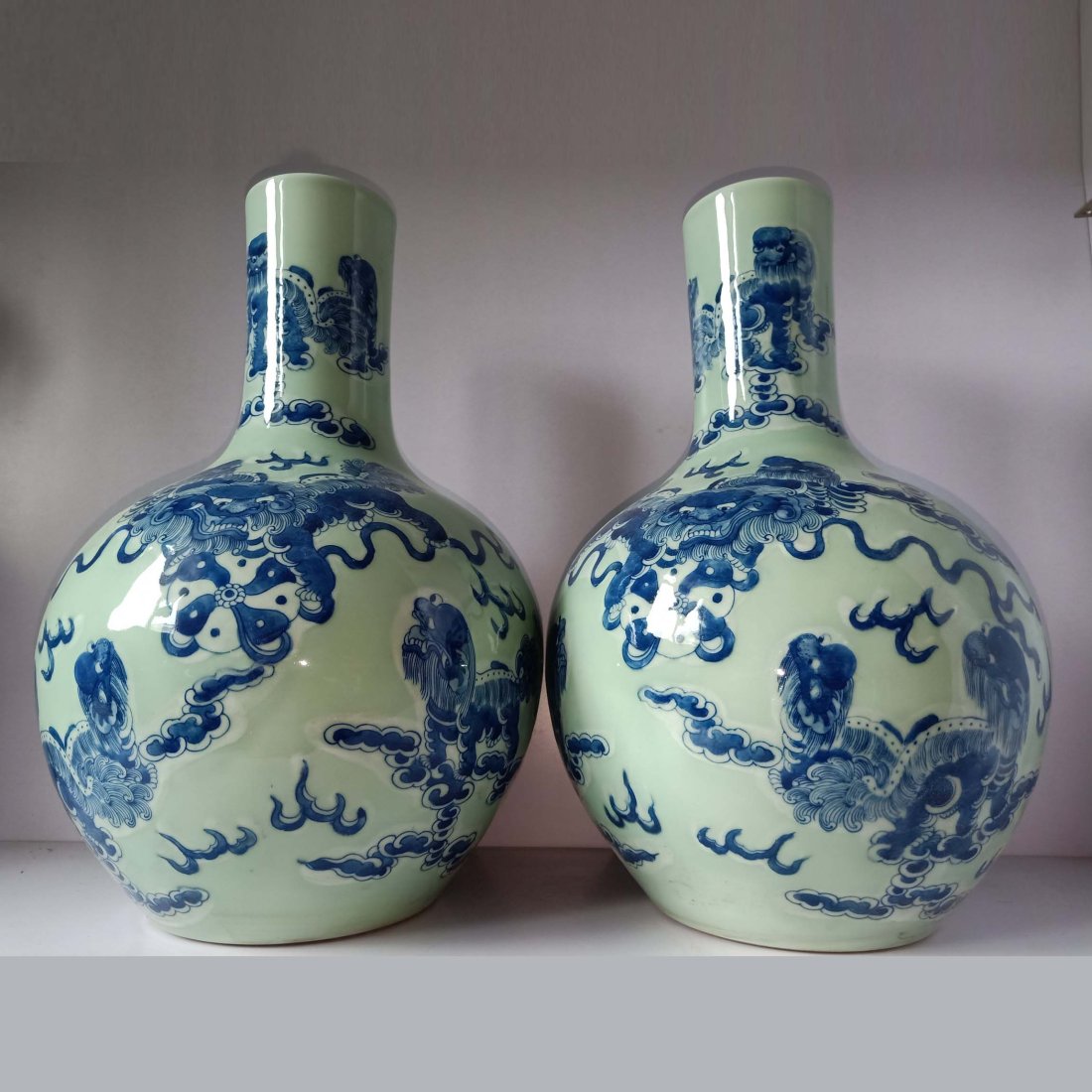 Qing Dynasty A Pair of Celestial Ball Vases with Bean Green Glaze and Blue Pattern (1 of 9)