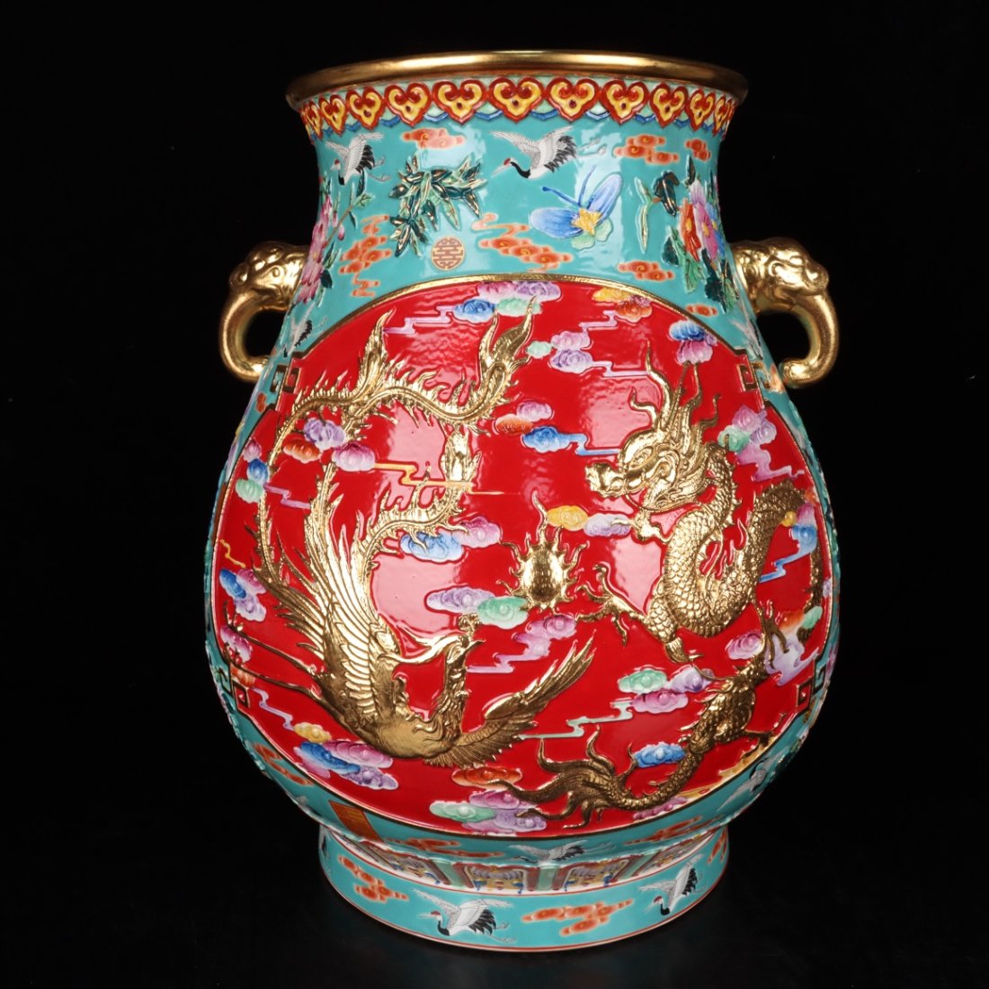 Qianlong Enamel and Gilt Elephant Ear Zun with Dragon and Phoenix Presenting Auspicious Pattern: Qianlong Enamel and Gilt Elephant Ear Zun with Dragon and Phoenix Presenting Auspicious Pattern. High 35CM wide 31cm Freight: 1.International Freight: Foreign shipping charges are determined by destin