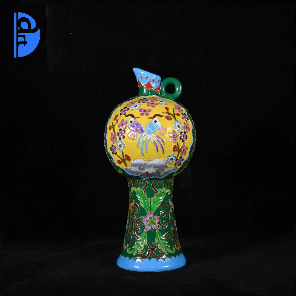 Song Ding kiln enamel color filigree plum vase: Song Ding kiln enamel color filigree plum vase source:Oriental Art Museum High 29CM wide 13cm Freight: 1.International Freight: Foreign shipping charges are determined by destination. 2.Photos, descri