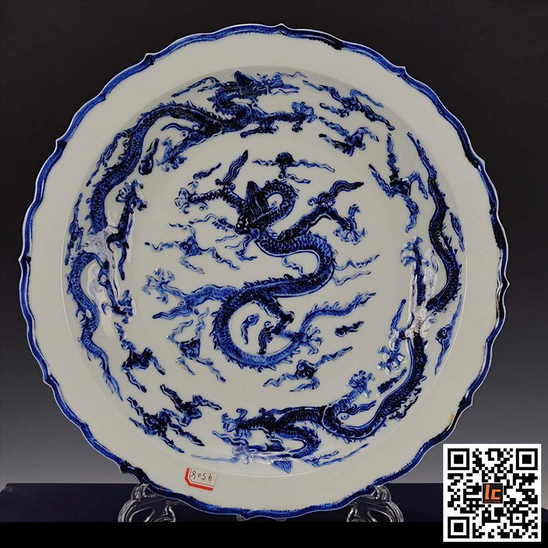 Ming Dynasty Xuande white-glazed embossed porcelain blue-and-white dragon pattern appreciation dish (1 of 9)