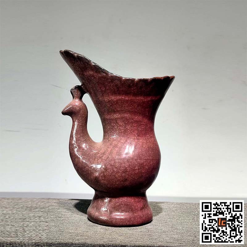 Ge Kiln red glaze split peacock cup: Ge Kiln red glaze split peacock cup High 23CM wide 16.5cm Important Declaration: Recently, it has come to our attention that our auction catalogs have been used by other auction houses. In order to pr