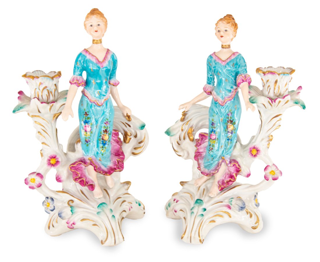 Pair of Hand Painted Porcelain Candle Holders: Up for auction is a pair of hand painted porcelain candle holders. Created in a classic Rococo style, each candle holder is brand new and stands 10 inches in height by 6 inches in width.