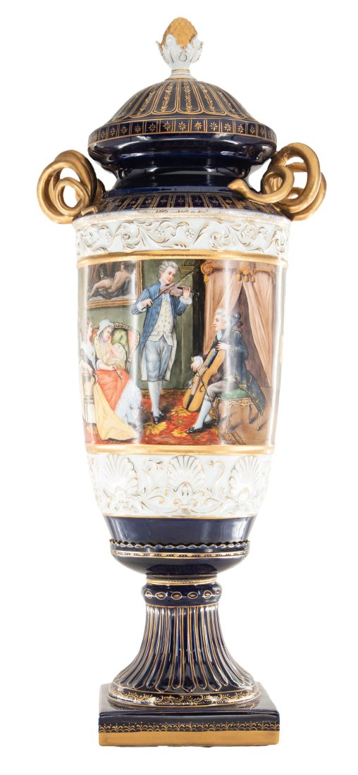 Society Porcelain Covered Vase: Up for auction is an exceptional porcelain jar. The jarâ€™s body sits on top of a flared stem, and a square base. This piece is highlighted by the incredibly detailed snake handles. The blue colo