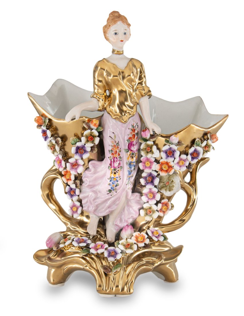 Porcelain Figure of Lady Holding Flowers: Up for auction is a hand painted porcelain figure. Created in a classic Rococo style, this figurine is brand new and stands 10 inches in height by 8 inches in width.