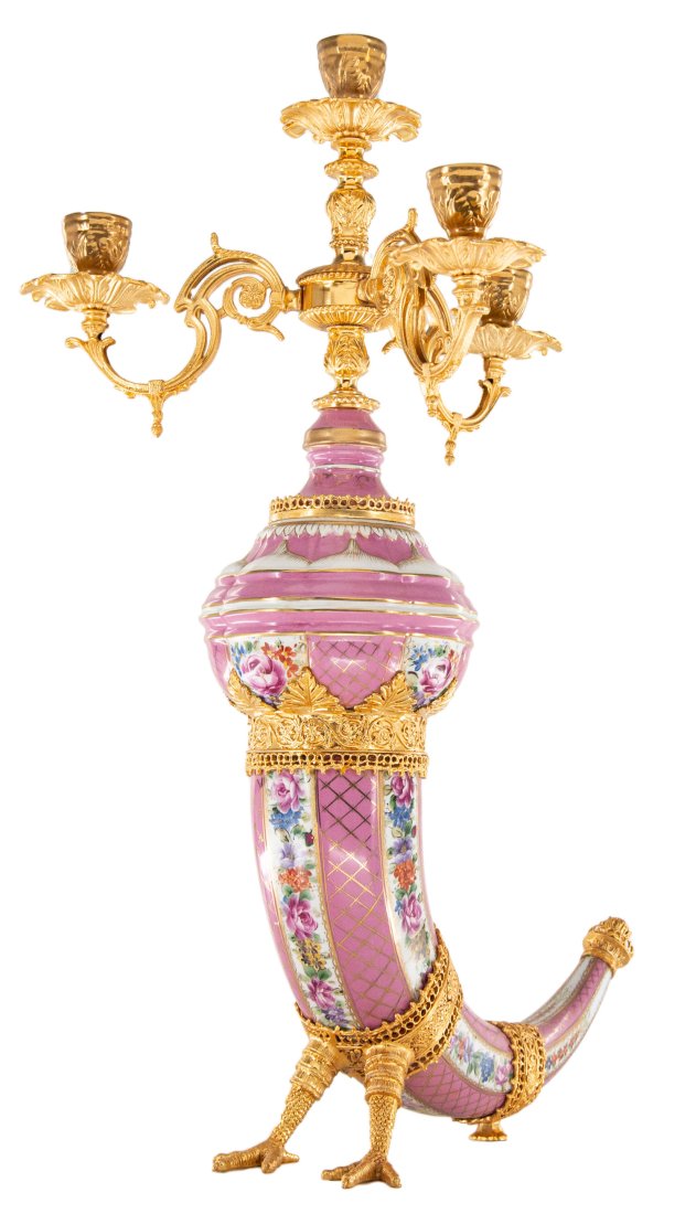 Four Cup Claw Foot Porcelain Candle Holder: Up for auction is an incredibly unique porcelain candle holder. The candle holderâ€™s body is in the shape of a horn and highlighted by the incredibly detailed bronze elements, including most not