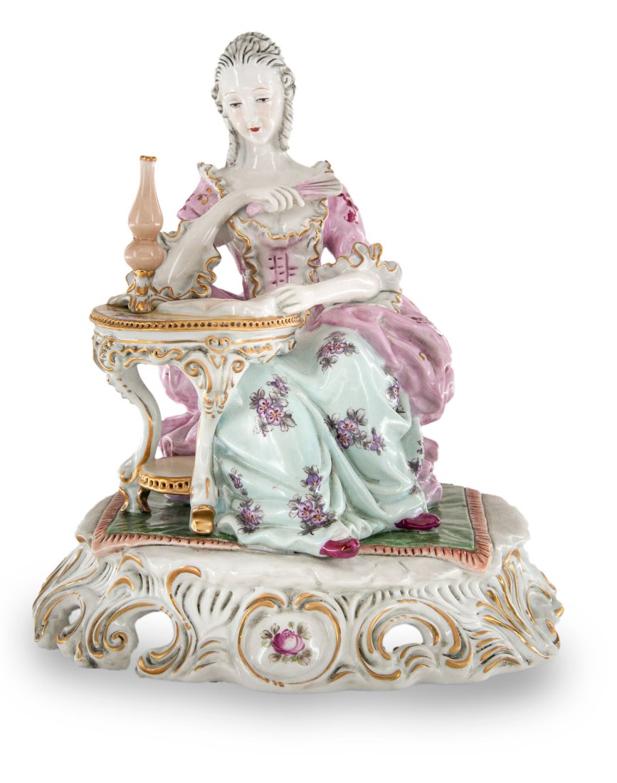 Lady Reading Hand Painted Porcelain Figurine: Up for auction is a hand painted porcelain figure depicting a woman reading. Created in a classic Rococo style, this figurine is brand new and stands 11 inches in height by 10 inches in width.
