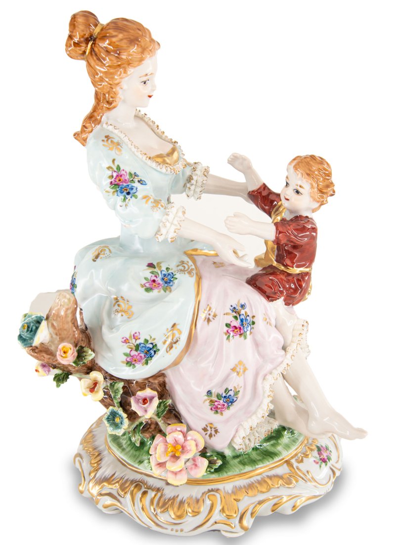 Mother and Son Porcelain Figurine: Up for auction is a hand painted porcelain figure depicting a mother and son. Created in a classic Rococo style, this figurine is brand new and stands 12 inches in height by 8 inches in width.