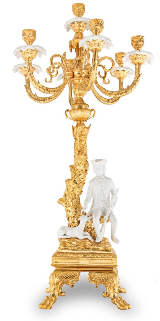 Bronze Seven Cup Candle Holder With Porcelain Hunter: Up for auction is an elegant bronze and porcelain candle holder. Every detail in this piece has been thoughtfully designed from the claw foot base to the natural stem. The piece incorporates seven cup