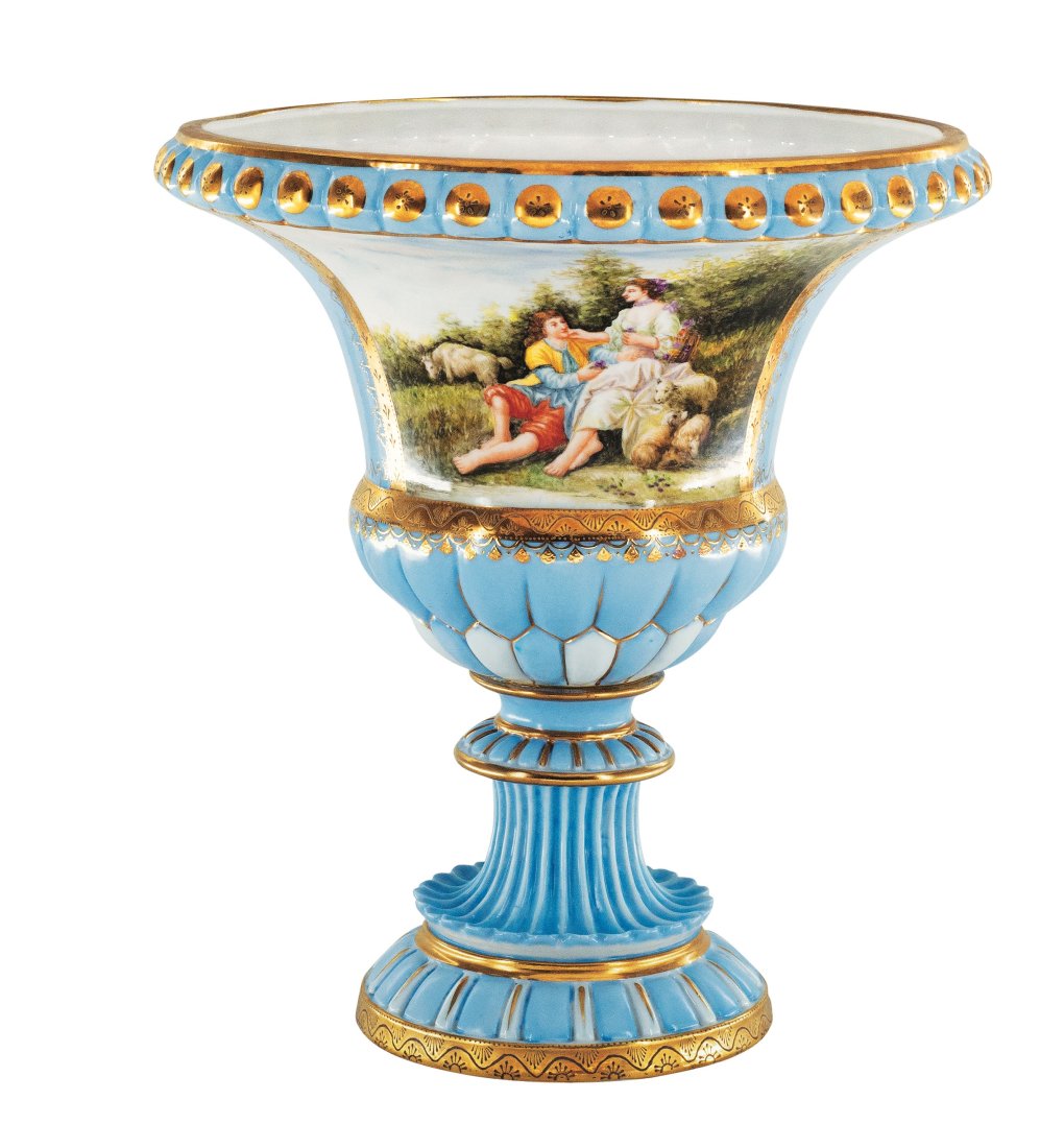 Rococo Style Porcelain Bowl: Up for auction is a beautiful porcelain serving bowl. The bowl sits on an ornate circular base and is completely hand painted. The blue colors of the jar are striking and elegant, creating a vivid bac