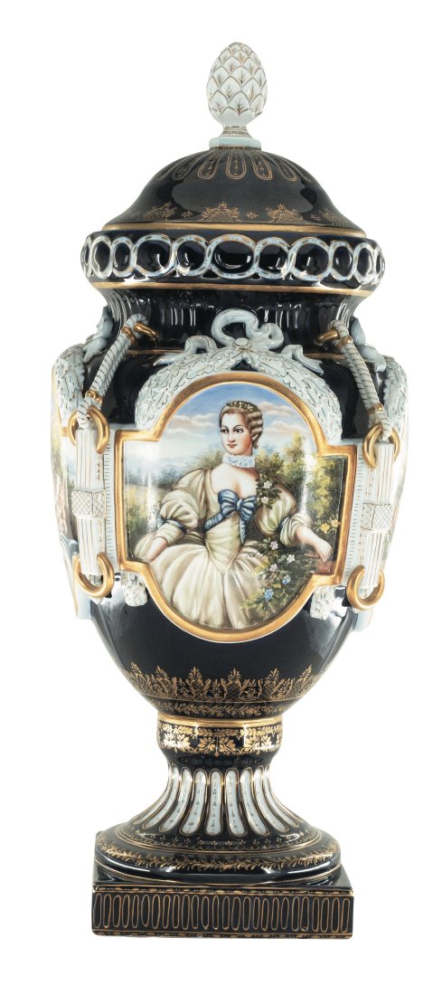 Hand Painted Rococo Style Porcelain Vase: Up for auction is an exceptional porcelain vase. The vaseâ€™s body sits on top of a flared stem, and a square base. This piece is highlighted by the incredibly detailed ring handles. The dark col