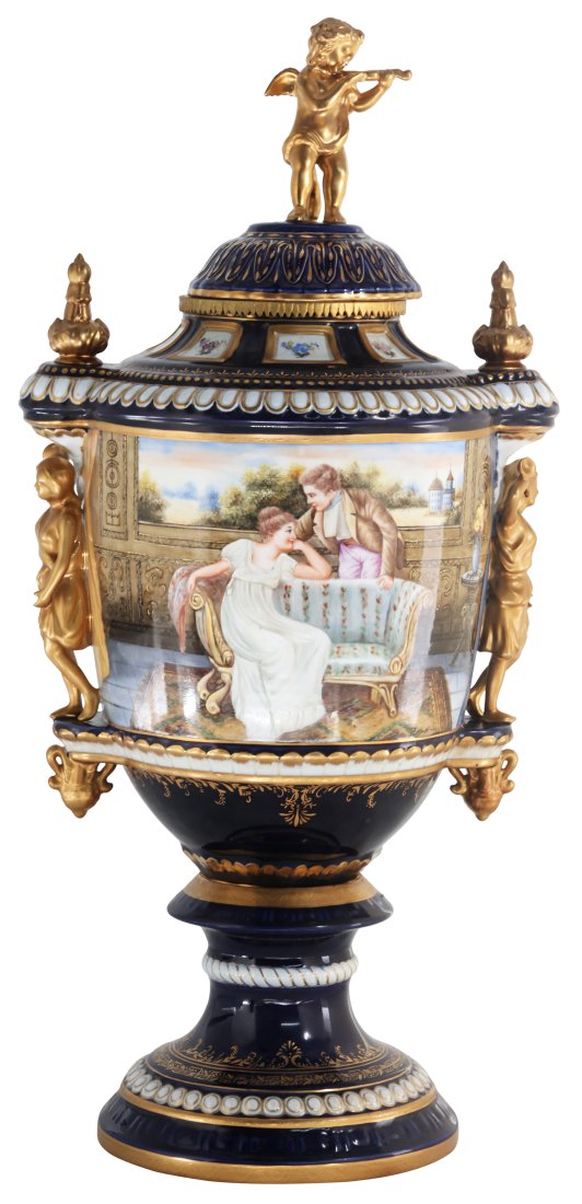 Hand Painted Rococo Style Porcelain Society Vase: Up for auction is an exceptional porcelain vase. The vaseâ€™s body sits on top of a flared stem, and circular base. This piece is highlighted by the incredibly detailed bronze handles and cherubs