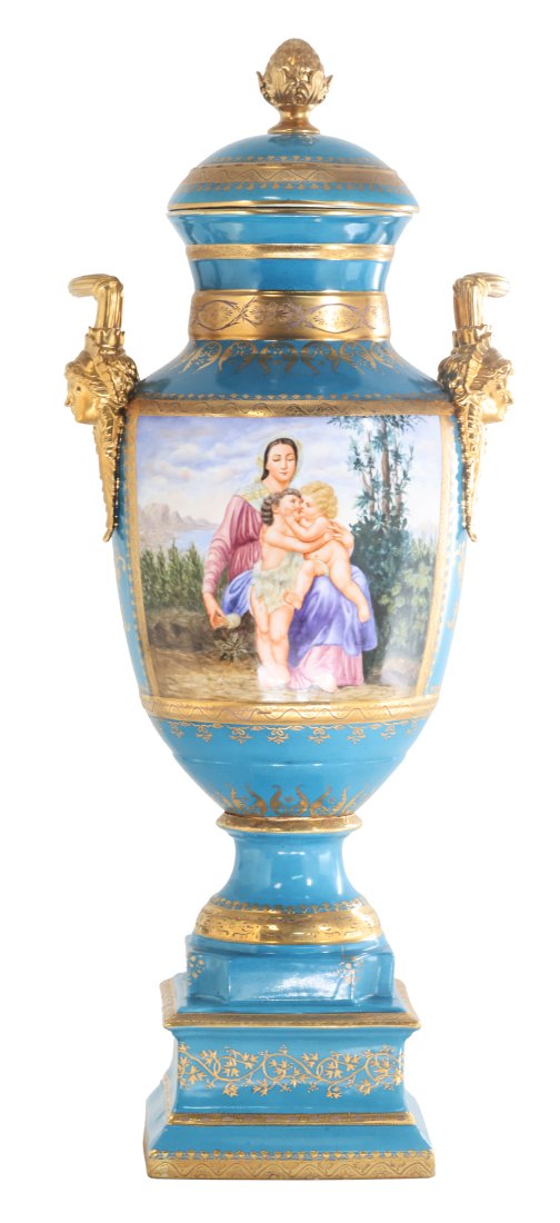 Hand Painted Cherub Porcelain And Bronze Vase: Up for auction is an exceptional porcelain vase. The vaseâ€™s body sits on top of a flared stem, and a square base. This piece is highlighted by the incredibly detailed bronze handles exemplifyin
