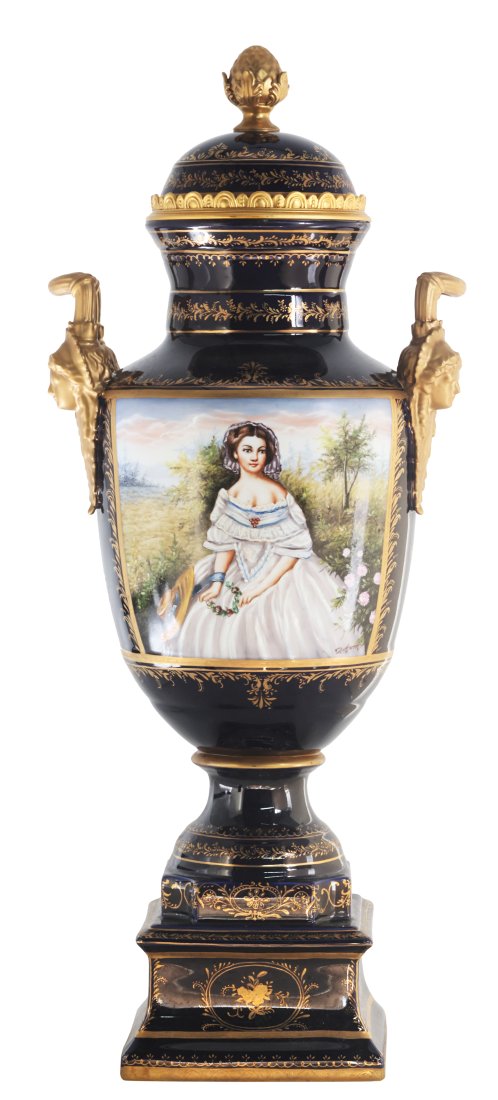 Beautiful Hand Painted Porcelain And Bronze Vase: Up for auction is an exceptional porcelain vase. The vaseâ€™s body sits on top of a flared stem, and a square base. This piece is highlighted by the incredibly detailed handles exemplifying femin