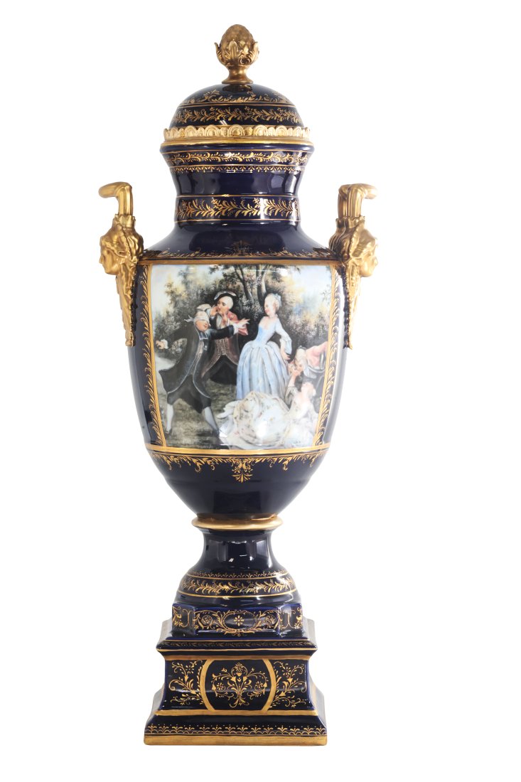 Rococo Style Hand Painted Porcelain And Bronze Vase: Up for auction is an exceptional porcelain vase. The vaseâ€™s body sits on top of a flared stem, and a square base. This piece is highlighted by the incredibly detailed handles exemplifying femin