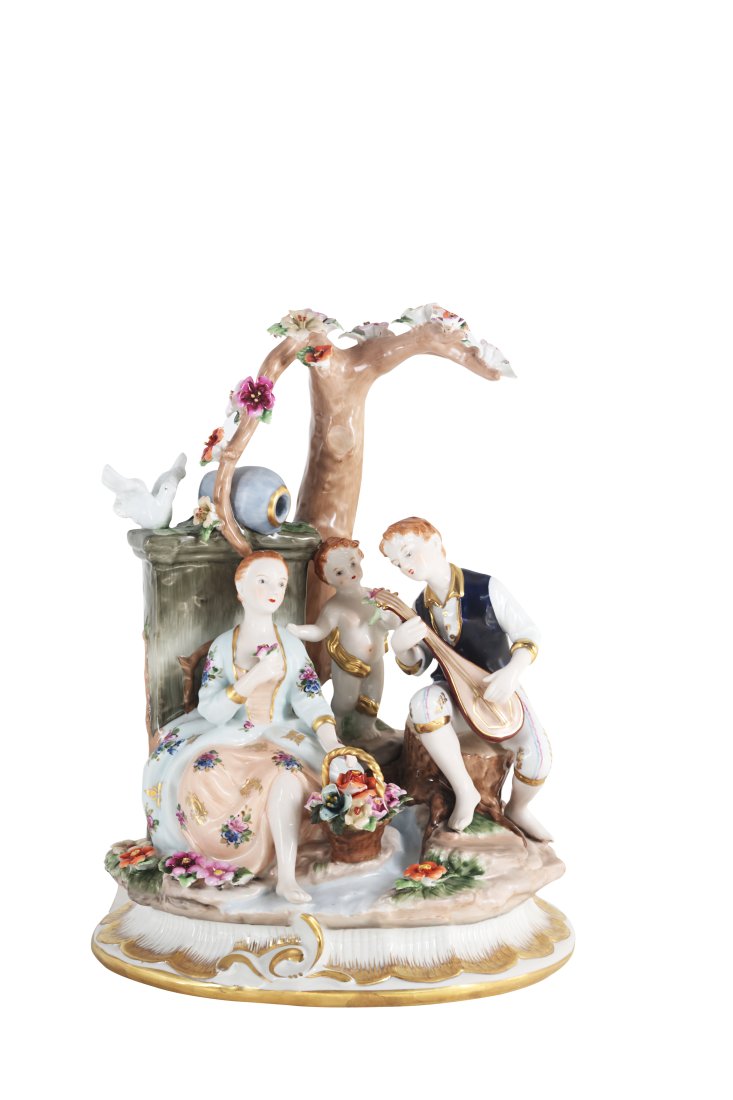 Hand Painted Rococo Style Porcelain Figure: Up for auction is a hand painted porcelain figure depicting a couple in love with a cherub behind them. Created in a classic Rococo style, this figurine is brand new and stands 13 inches in height.
