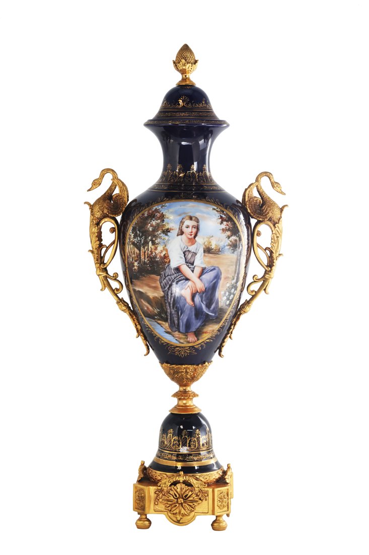 Striking Porcelain and Bronze Goose Handle Vase: Up for auction is an exceptional porcelain vase. The vaseâ€™s body sits on top of a flared stem, and a bronze square base. This piece is highlighted by the incredibly detailed bronze geese handle