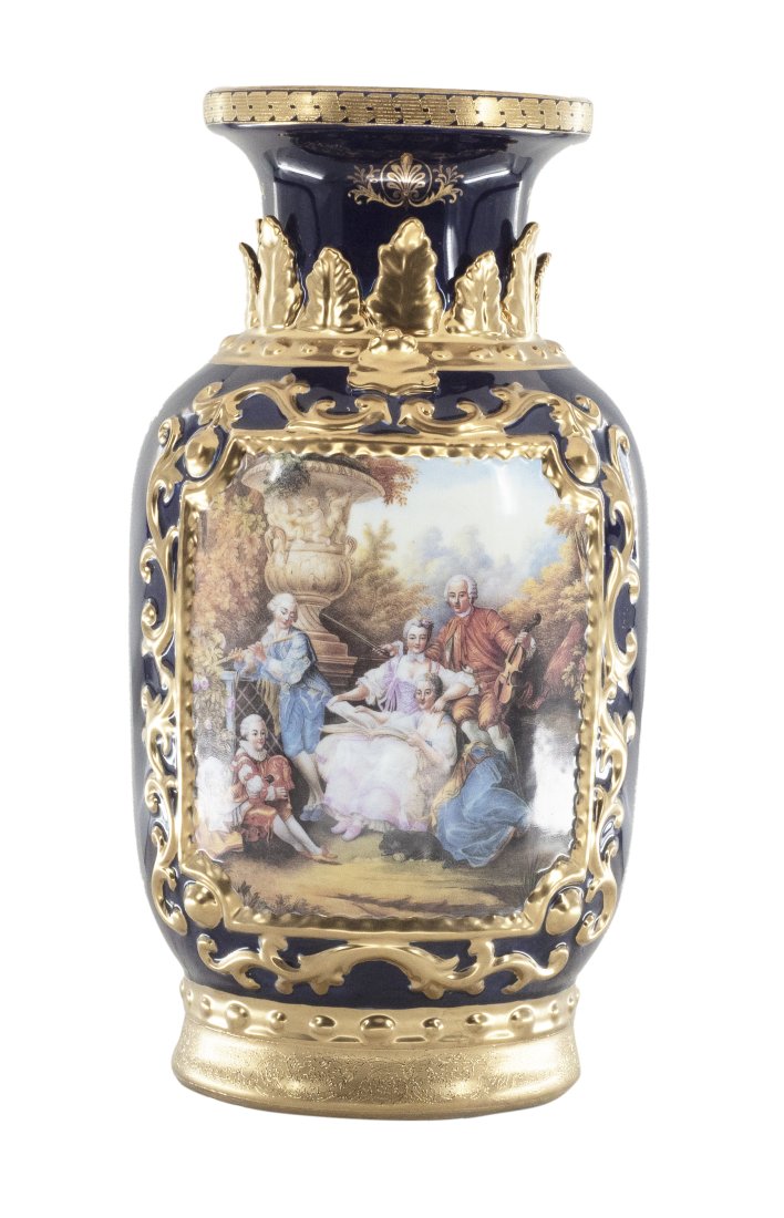 Hand Painted Porcelain Vase With Gold Detailing: Up for auction is a beautiful porcelain vase. The dark blue color of the vase is striking and sophisticated, creating a vivid backdrop for the pieceâ€™s hand painted Rococo motif. It depicts a so