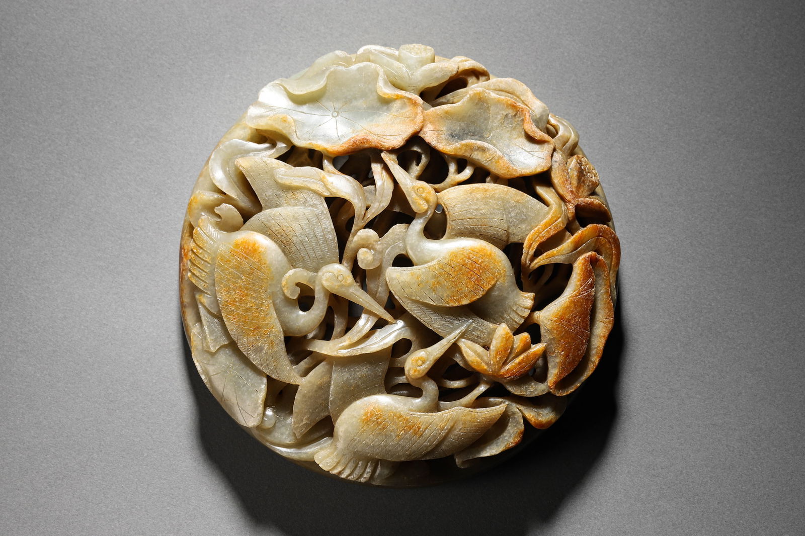 CHINESE SPRING WATER PATTERN HOLLOW JADE TILE: CHINESE SPRING WATER PATTERN HOLLOW JADE TILE Diam: 5 1/8 in. (13 cm) Click here for high resolution images.