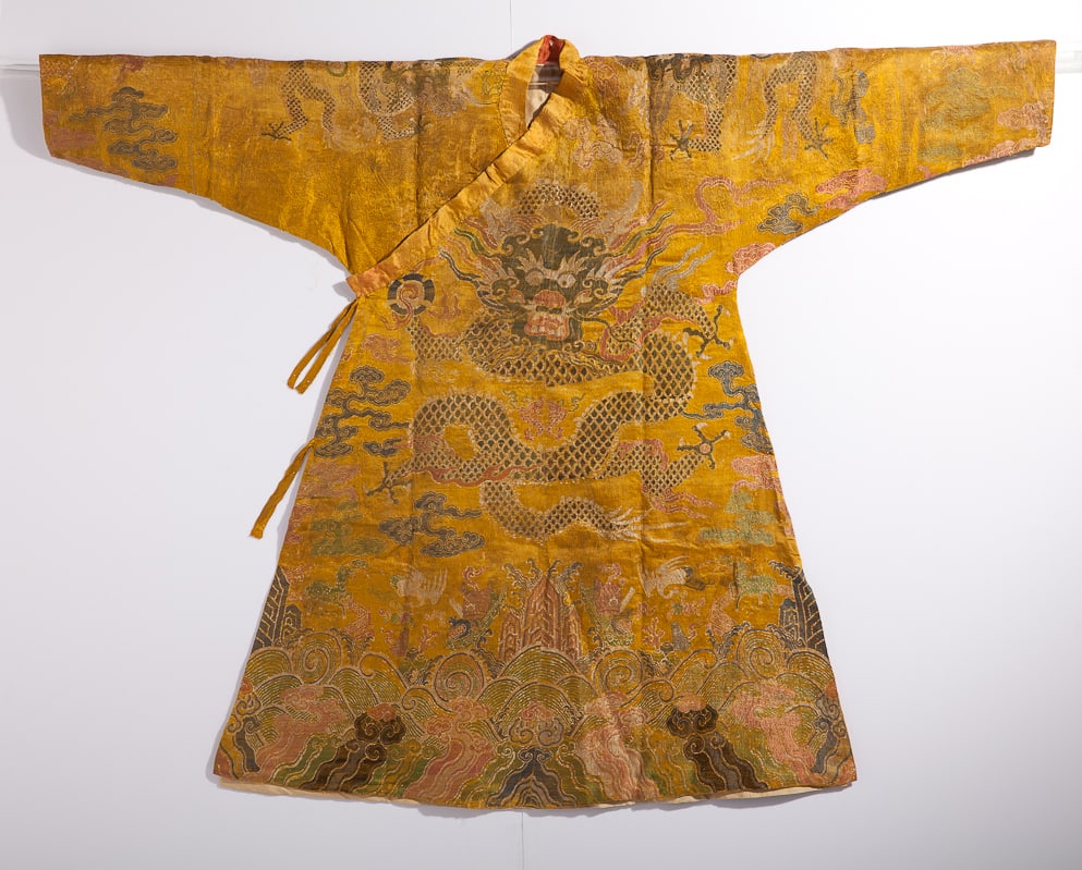 A CHINESE YELLOW EMBROIDERED DRAGON ROBE, POSSIBLY QING DYNASTY, 19TH CENTURY. (1 of 3)