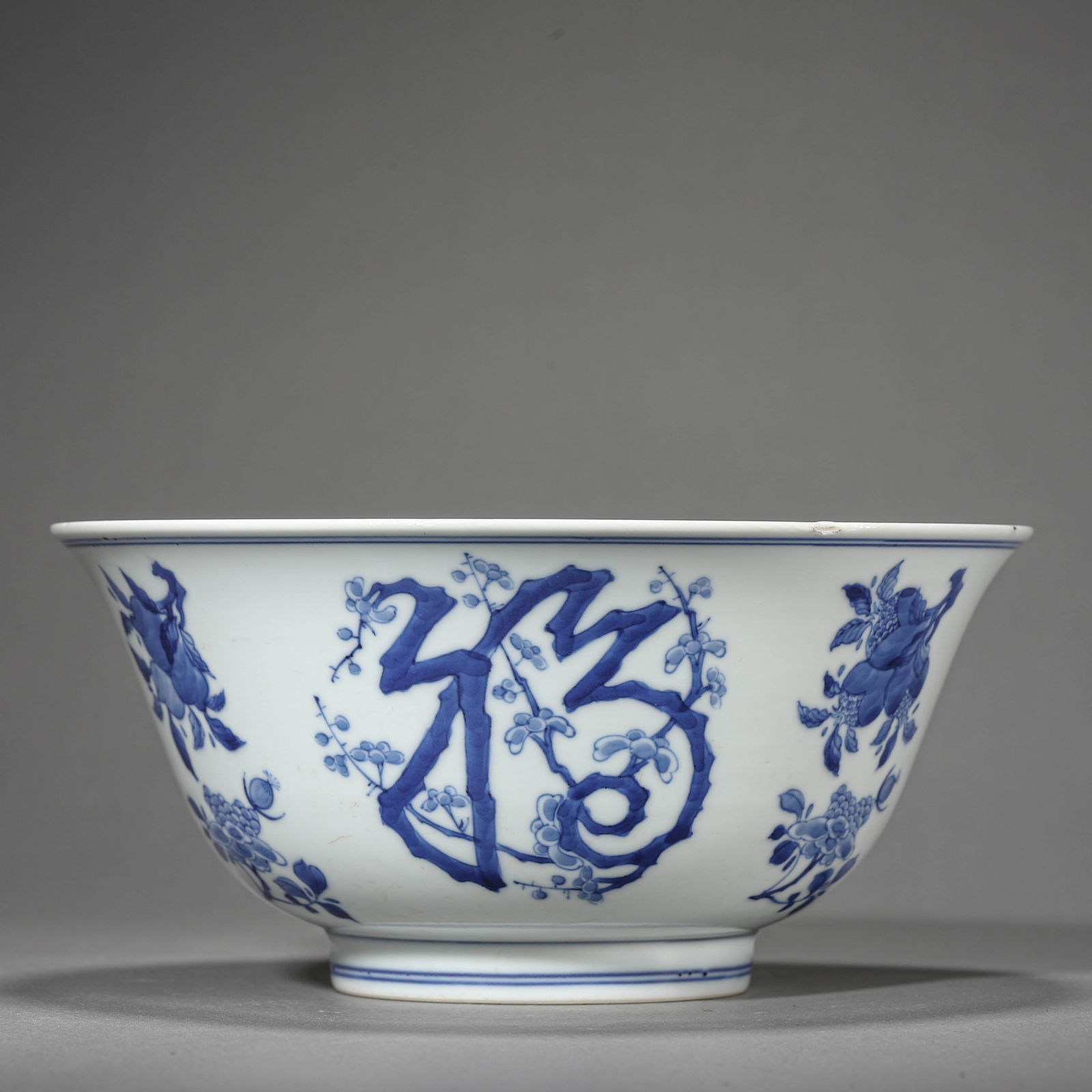 A CHINESE BLUE AND WHITE BOWL WITH "FU LU SHOU" MOTIFS, MARKED "DA QING KANGXI NIANZHI," POSSIBLY (1 of 4)